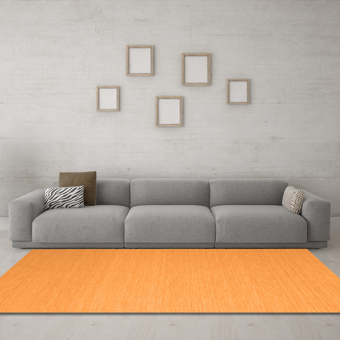 Machine Washable Solid Orange Modern Area Rugs in a Living Room, wshcon725org