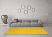 Machine Washable Solid Yellow Modern Rug in a Living Room, wshcon725yw