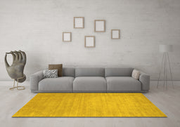 Machine Washable Solid Yellow Modern Rug in a Living Room, wshcon72yw