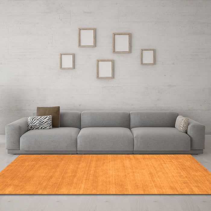 Machine Washable Solid Orange Modern Area Rugs in a Living Room, wshcon72org