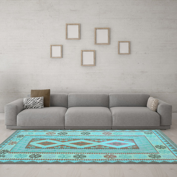 Machine Washable Oriental Light Blue Traditional Rug in a Living Room, wshcon738lblu