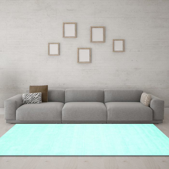 Machine Washable Solid Turquoise Modern Area Rugs in a Living Room,, wshcon75turq
