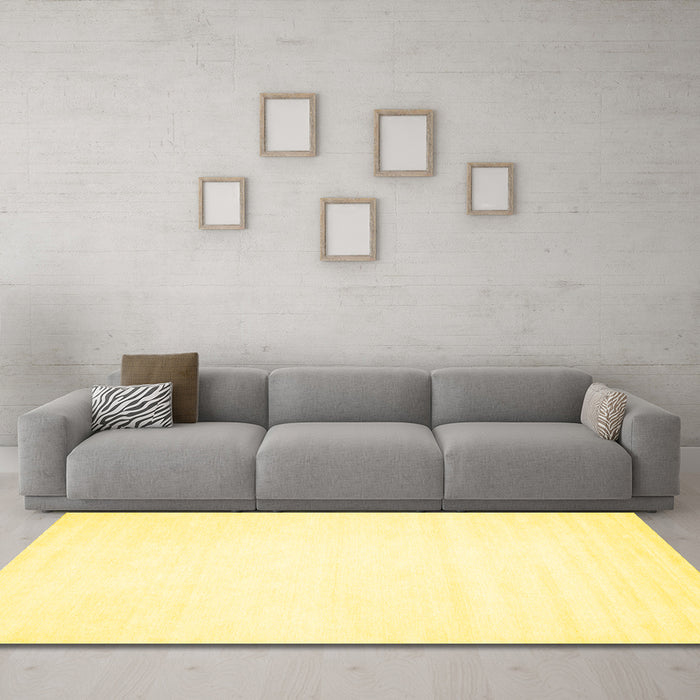 Machine Washable Solid Yellow Modern Rug in a Living Room, wshcon76yw