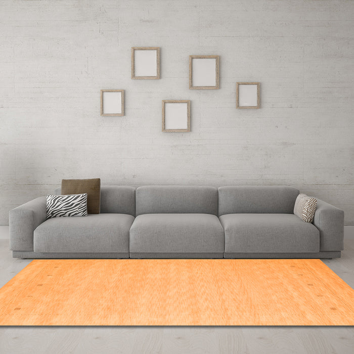 Machine Washable Solid Orange Modern Area Rugs in a Living Room, wshcon790org