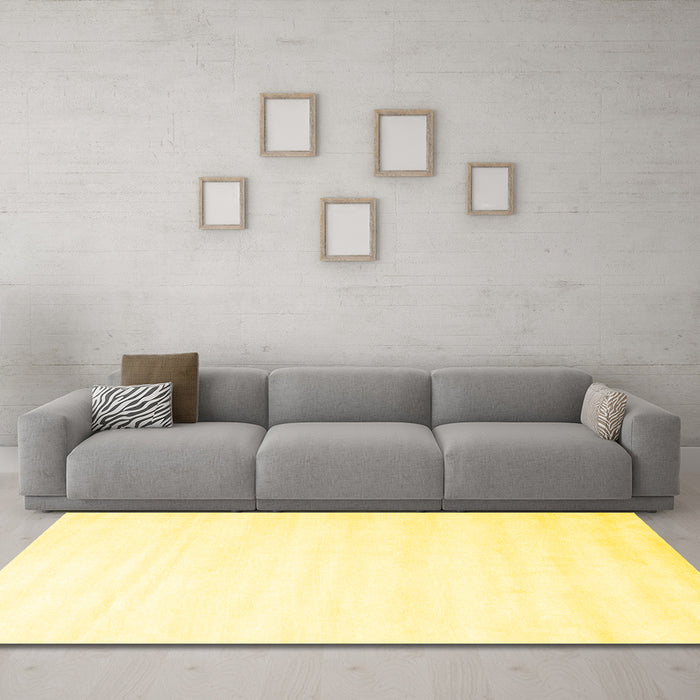 Machine Washable Solid Yellow Modern Rug in a Living Room, wshcon7yw