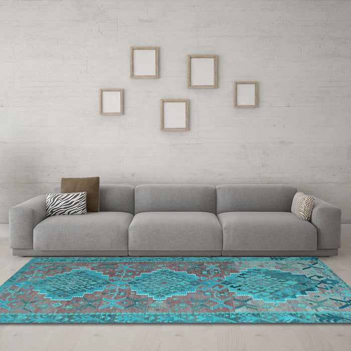 Machine Washable Oriental Light Blue Traditional Rug in a Living Room, wshcon821lblu