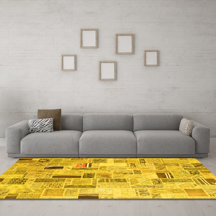 Machine Washable Patchwork Yellow Transitional Rug in a Living Room, wshcon861yw