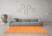 Machine Washable Solid Orange Modern Area Rugs in a Living Room, wshcon884org