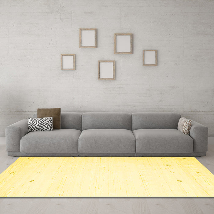 Machine Washable Solid Yellow Modern Rug in a Living Room, wshcon889yw
