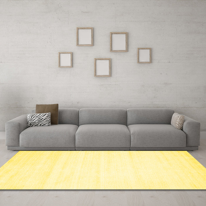 Machine Washable Solid Yellow Modern Rug in a Living Room, wshcon89yw