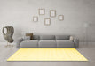 Machine Washable Solid Yellow Modern Rug in a Living Room, wshcon900yw