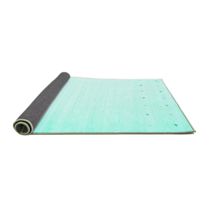Sideview of Solid Turquoise Modern Rug, con900turq
