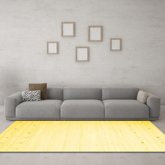 Machine Washable Solid Yellow Modern Rug in a Living Room, wshcon901yw