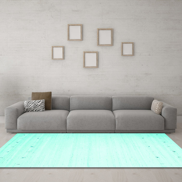 Machine Washable Solid Turquoise Modern Area Rugs in a Living Room,, wshcon901turq