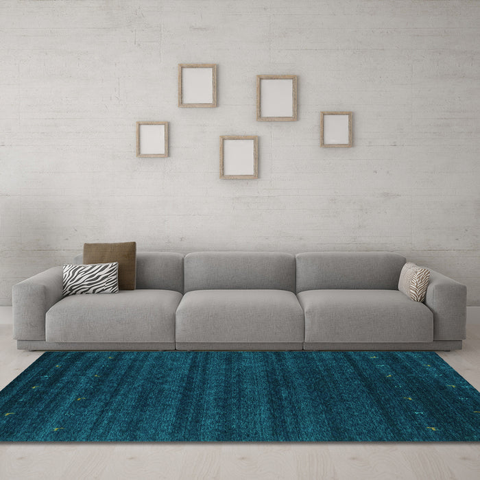 Machine Washable Abstract Turquoise Contemporary Area Rugs in a Living Room,, wshcon902turq