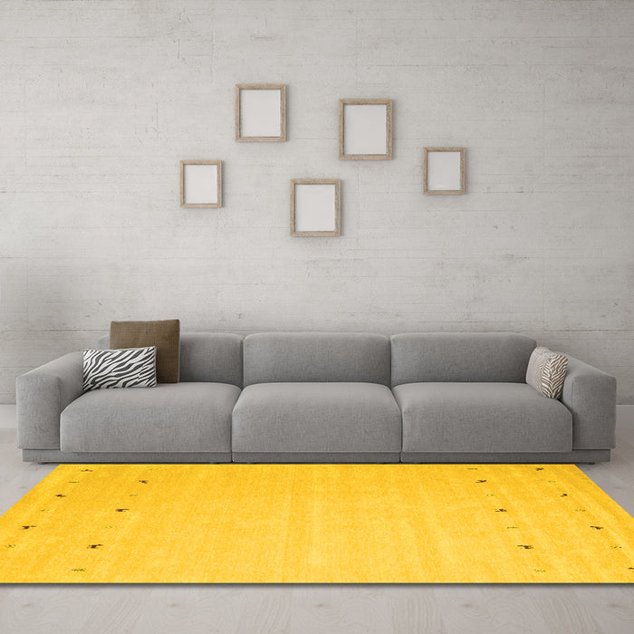 Machine Washable Solid Yellow Modern Rug in a Living Room, wshcon922yw