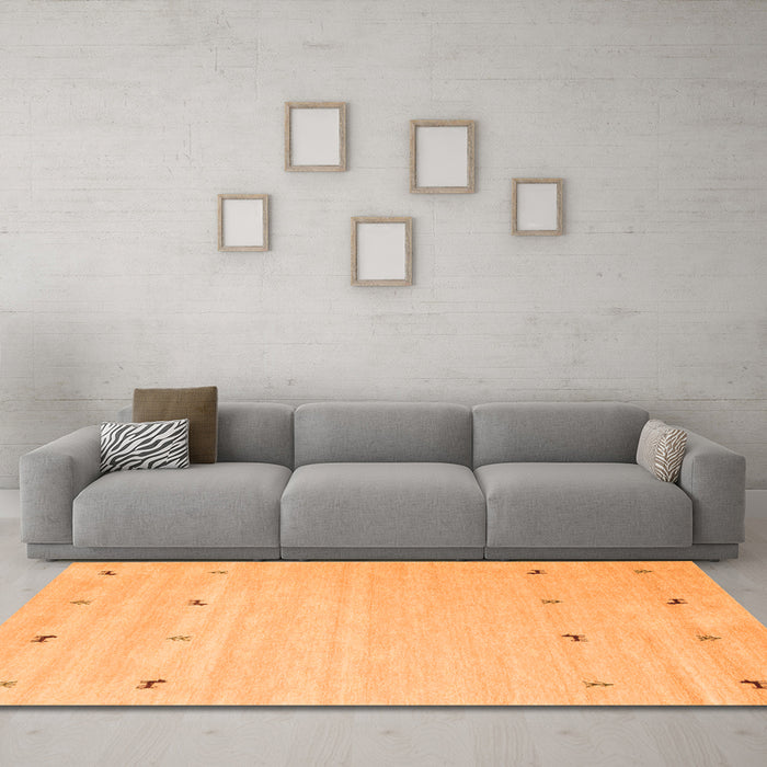 Machine Washable Solid Orange Modern Area Rugs in a Living Room, wshcon935org