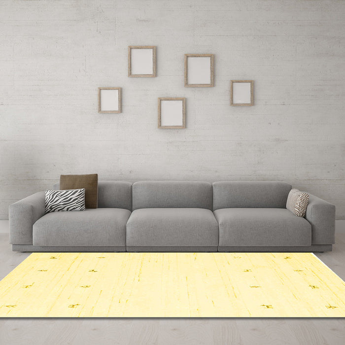 Machine Washable Solid Yellow Modern Rug in a Living Room, wshcon936yw