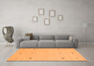 Machine Washable Solid Orange Modern Area Rugs in a Living Room, wshcon947org