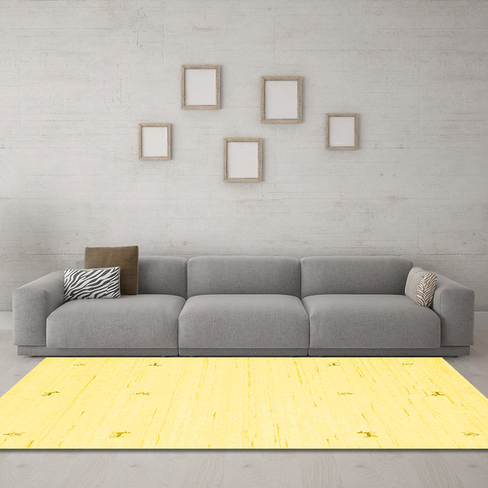 Machine Washable Solid Yellow Modern Rug in a Living Room, wshcon950yw