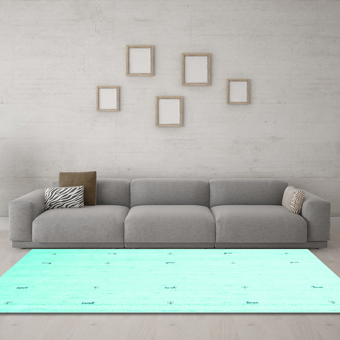 Machine Washable Solid Turquoise Modern Area Rugs in a Living Room,, wshcon954turq