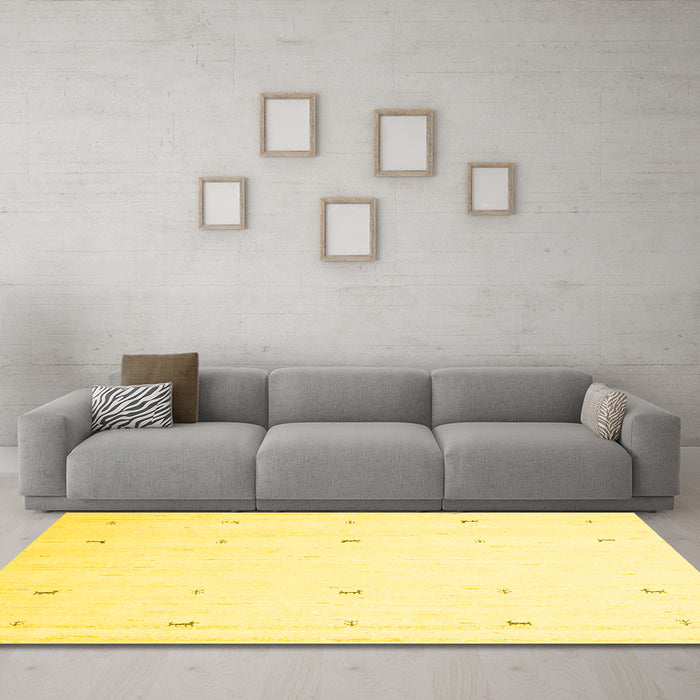 Machine Washable Solid Yellow Modern Rug in a Living Room, wshcon954yw