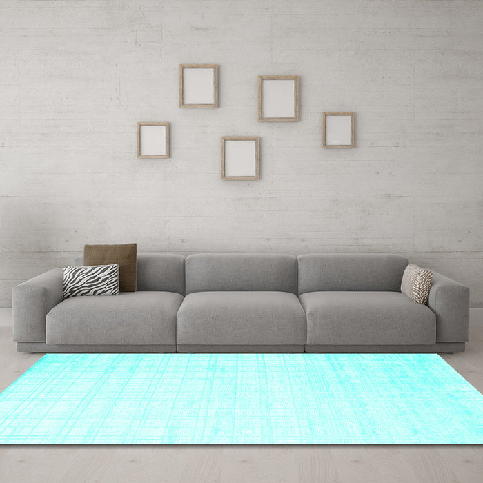 Machine Washable Solid Turquoise Modern Area Rugs in a Living Room,, wshcon963turq
