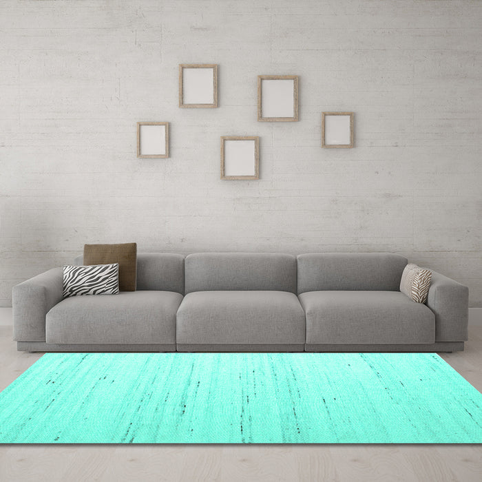 Machine Washable Solid Turquoise Modern Area Rugs in a Living Room,, wshcon986turq