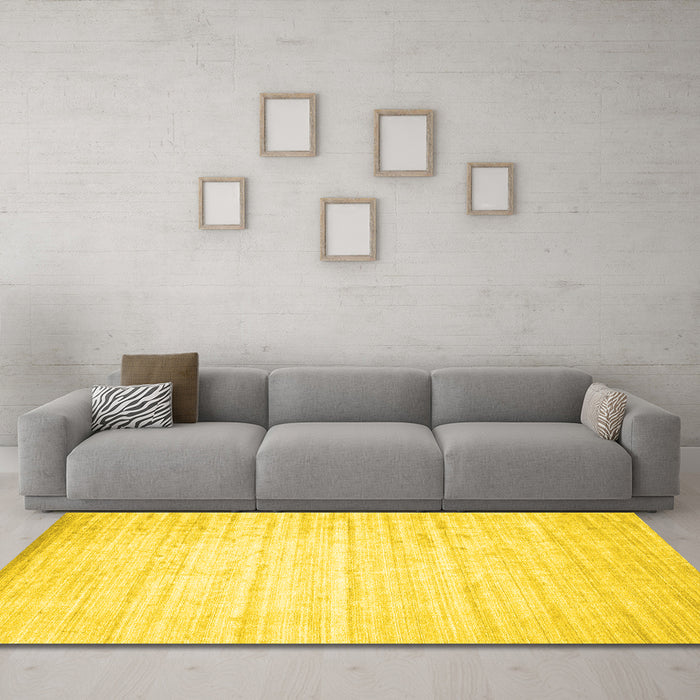 Machine Washable Solid Yellow Modern Rug in a Living Room, wshcon987yw