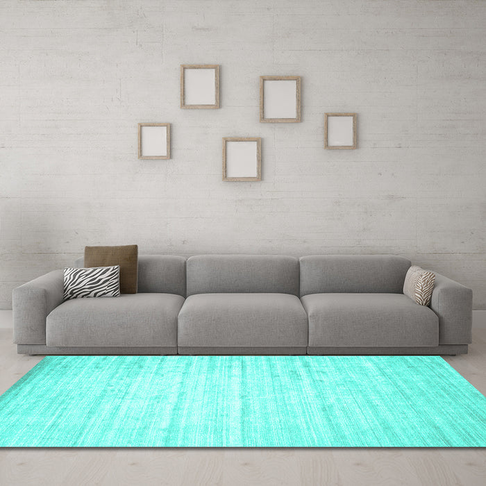 Machine Washable Solid Turquoise Modern Area Rugs in a Living Room,, wshcon987turq