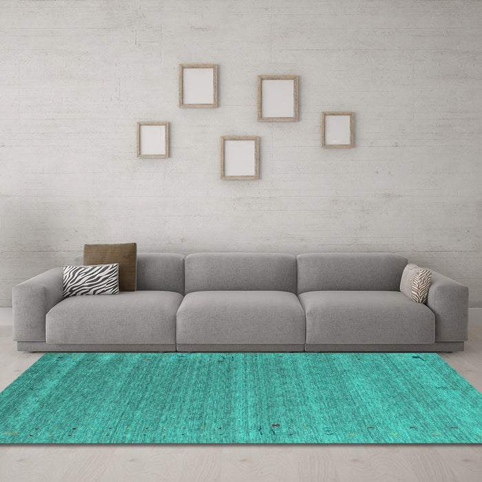 Machine Washable Abstract Turquoise Contemporary Area Rugs in a Living Room,, wshcon990turq