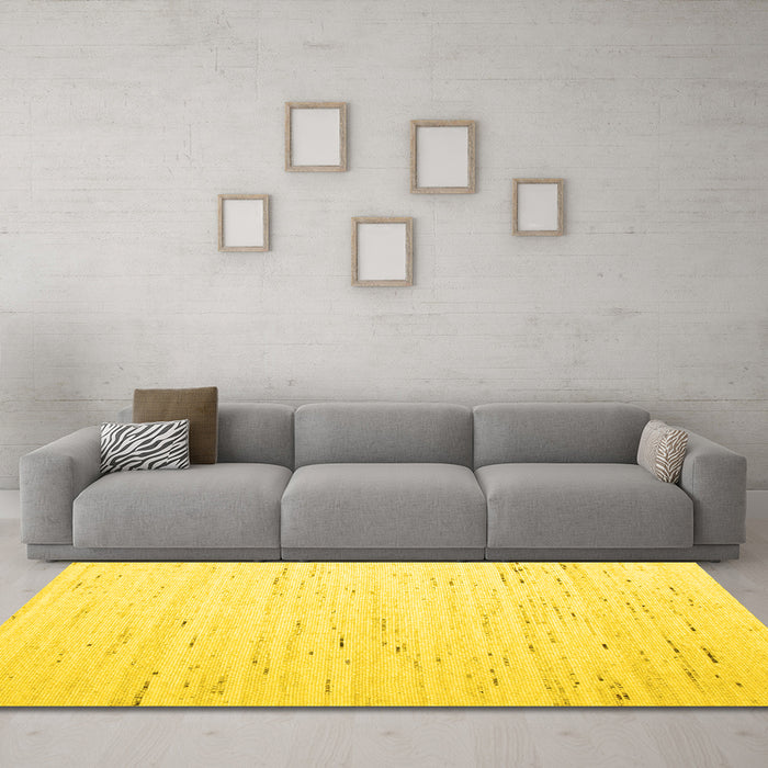 Machine Washable Solid Yellow Modern Rug in a Living Room, wshcon996yw