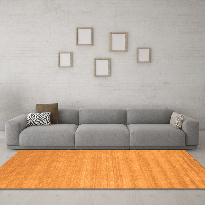 Machine Washable Solid Orange Modern Area Rugs in a Living Room, wshcon99org