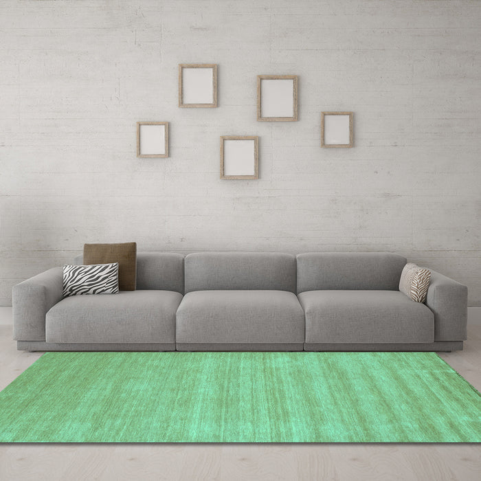 Machine Washable Solid Turquoise Modern Area Rugs in a Living Room,, wshcon99turq