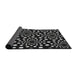 Thickness of Patterned Black Novelty Rug, pat1059