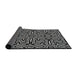 Thickness of Patterned Black Novelty Rug, pat1665