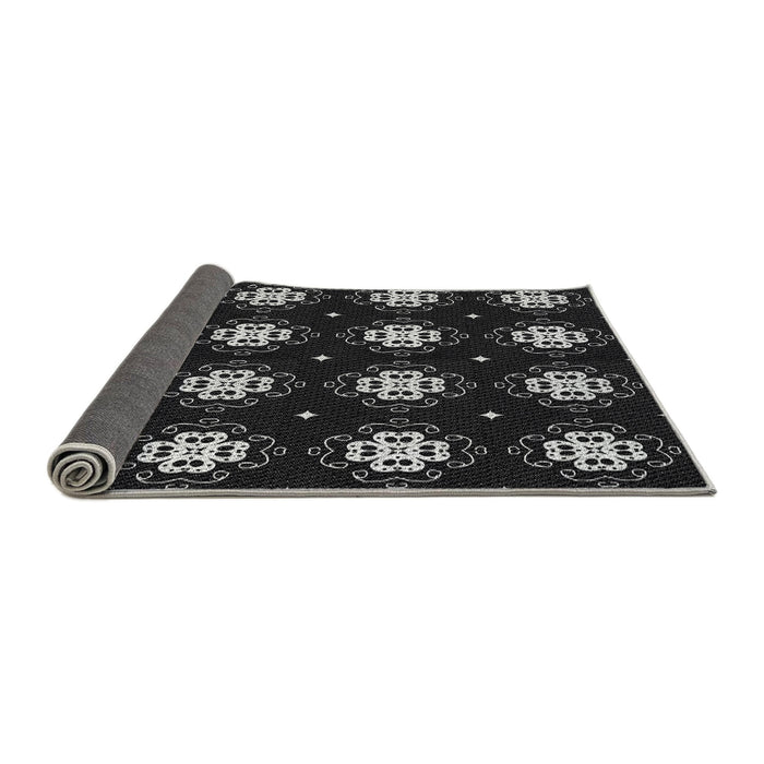 Thickness of Patterned Black Novelty Rug, pat2139