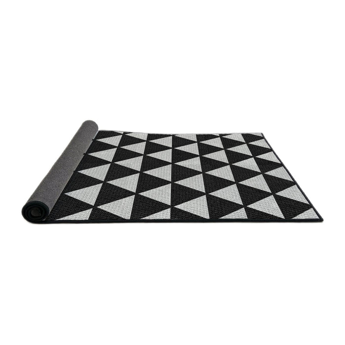 Thickness of Patterned Black Novelty Rug, pat2207