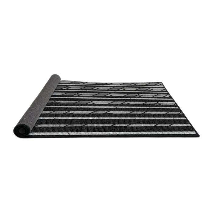 Thickness of Patterned Black Novelty Rug, pat240