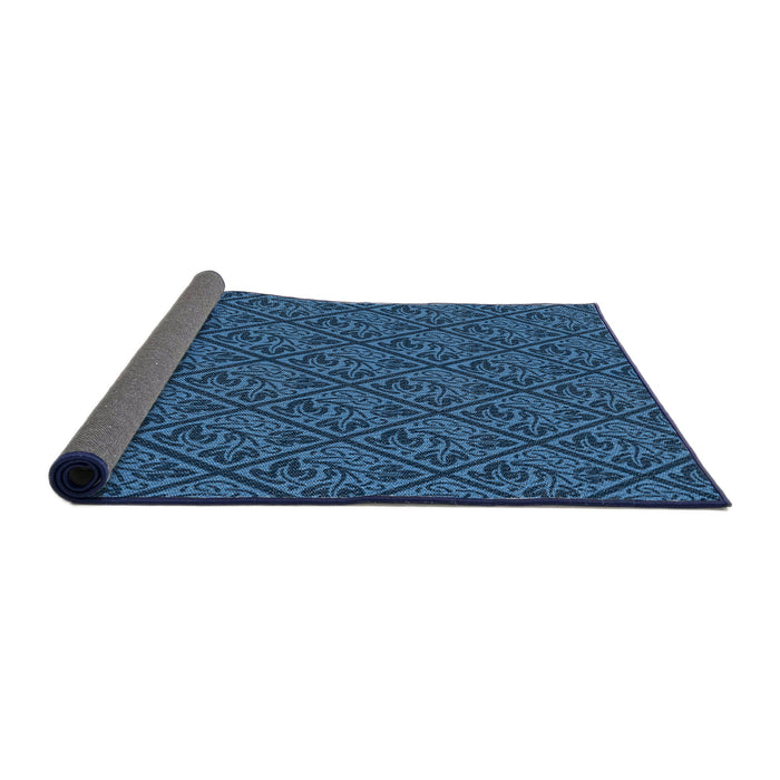 Thickness of Patterned Blue Novelty Rug, pat2610