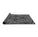 Thickness of Patterned Black Novelty Rug, pat2623