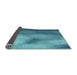 Thickness of Patterned Blue Novelty Rug, pat2785