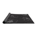 Thickness of Patterned Black Novelty Rug, pat2845