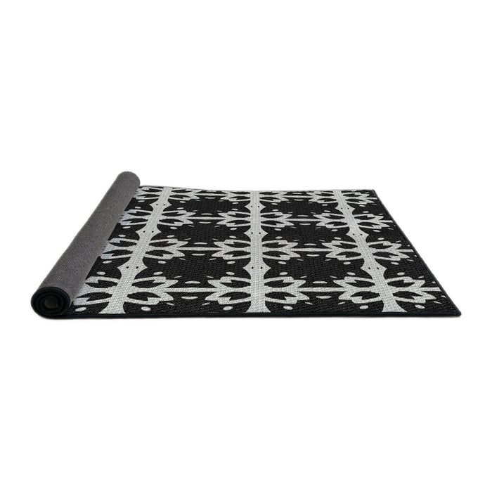 Thickness of Patterned Black Novelty Rug, pat2908