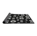 Thickness of Patterned Black Novelty Rug, pat2931