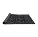 Thickness of Patterned Black Novelty Rug, pat3277