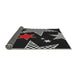 Thickness of Patterned Black Novelty Rug, pat3464