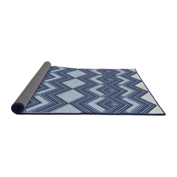 Thickness of Patterned Blue Novelty Rug, pat3536
