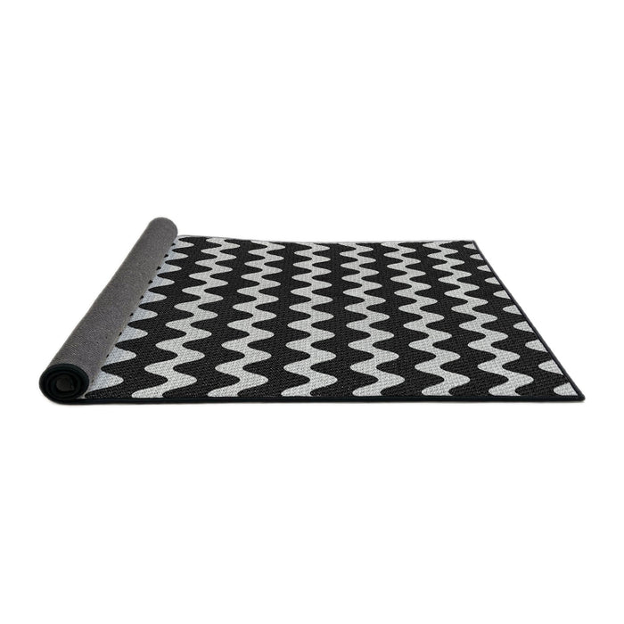 Thickness of Patterned Black Novelty Rug, pat3920