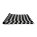 Thickness of Patterned Black Novelty Rug, pat3920